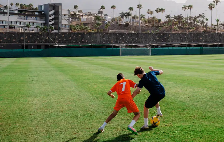 Children playing football during a training session at Tenerife Top Training